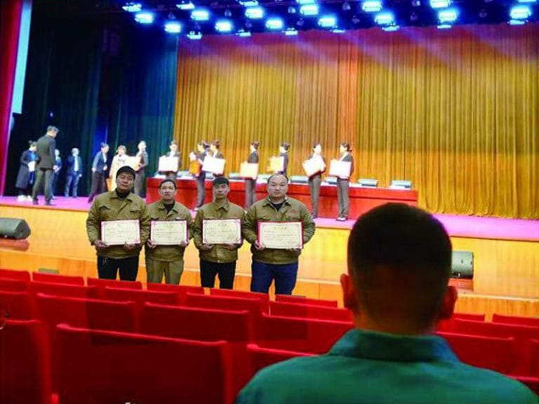 Gaoshan Valves employees receiving awards at the 2nd Xingyang Vocational Skills Competition for CNC Turning